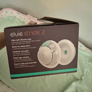 Elvie pump set with green accents